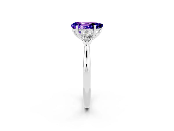 Silver Three-Stone Pear Cut Tanzanite Ring with Pear  Side Stones in Four-Prong Setting