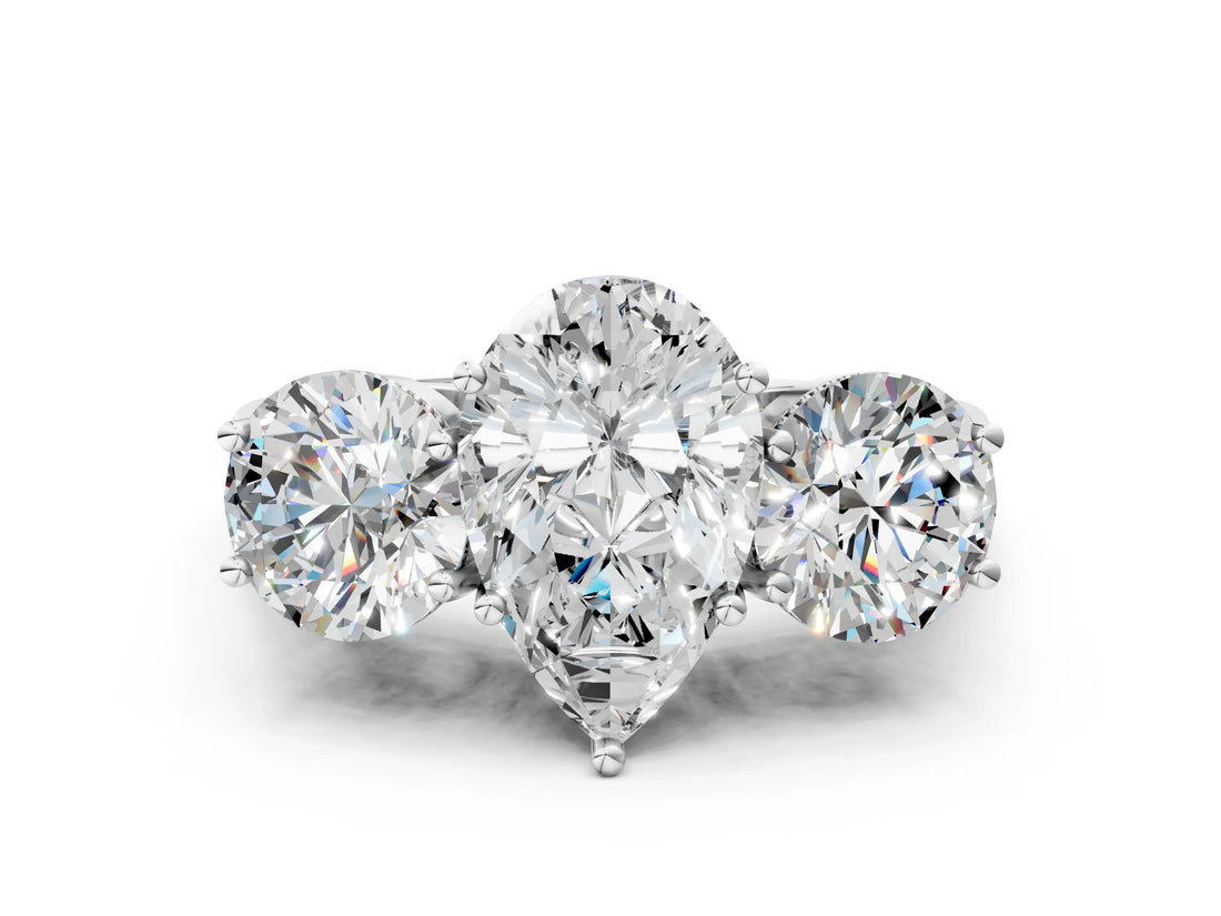 White gold Three-Stone Pear Diamond Engagement Ring with Prong Setting on a Classic Band_3
