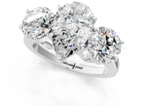 White gold Three-Stone Pear Diamond Engagement Ring with Prong Setting on a Classic Band_4