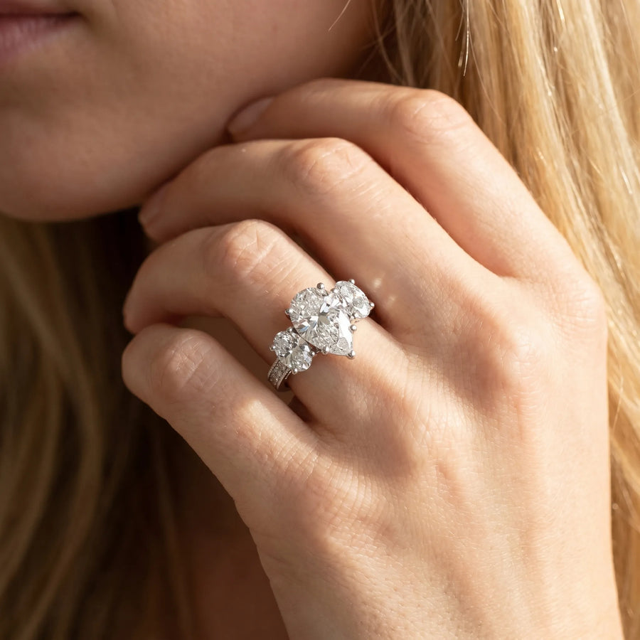 White gold Three-Stone Pear Diamond Milgrain Pave Band with Prong Setting