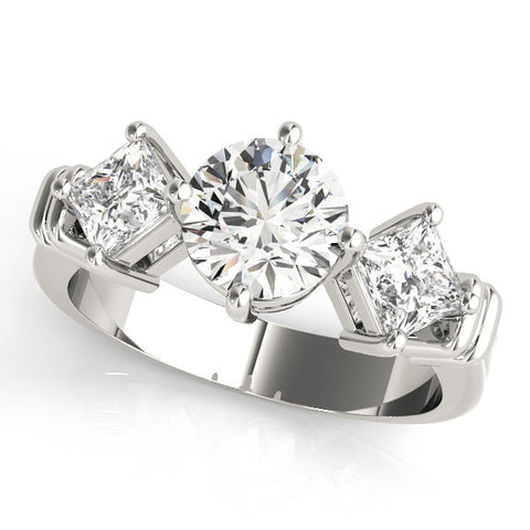 White gold Three-Stone Pear and Princess Cut Diamond Ring with Channel Band and Four-Prong Setting