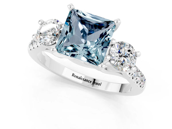 Platinum Three-Stone Princess Cut Aquamarine Pavé Band with Four-Prong Setting