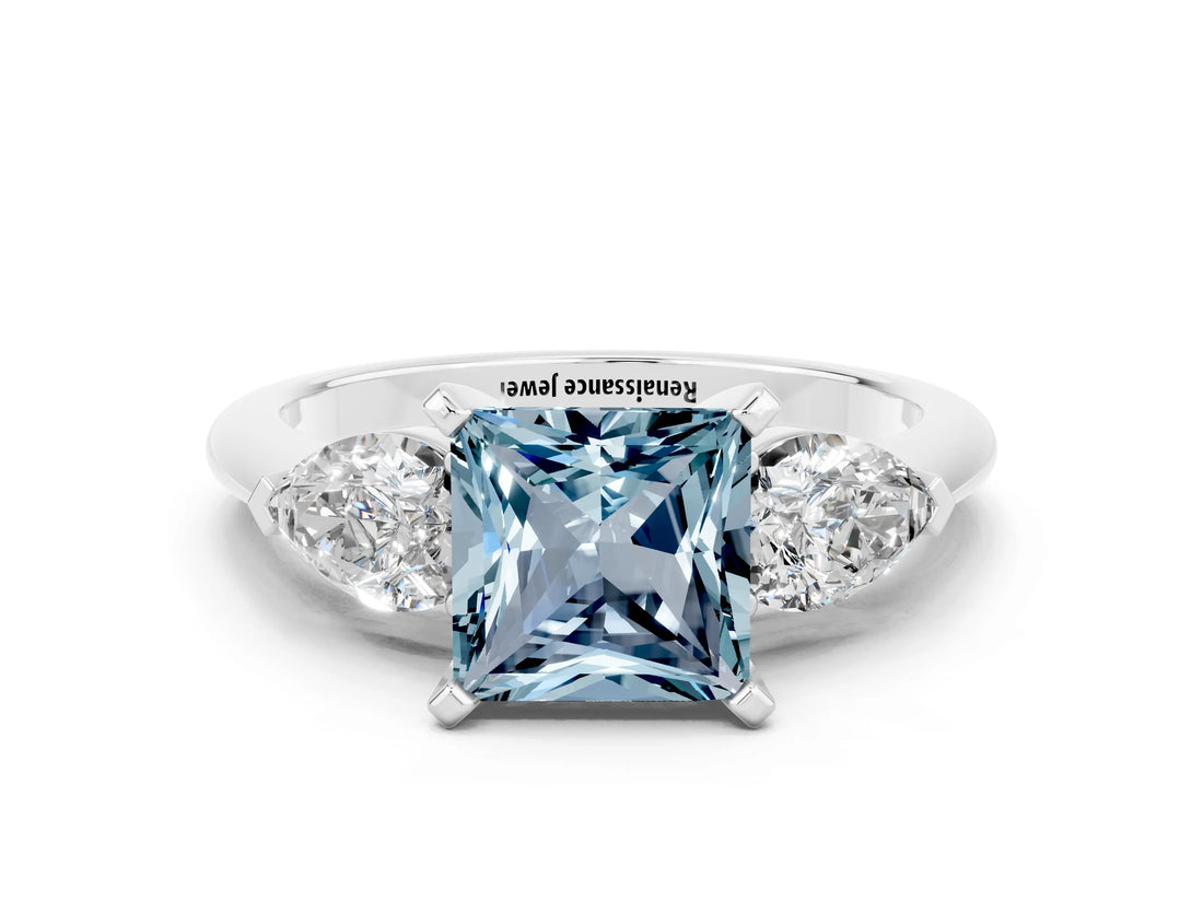 White gold Three-Stone Princess Cut Aquamarine Ring with Pear Side Stones and Four-Prong Setting