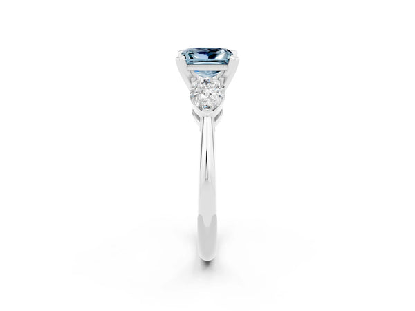 Silver Three-Stone Princess Cut Aquamarine Ring with Pear Side Stones and Four-Prong Setting