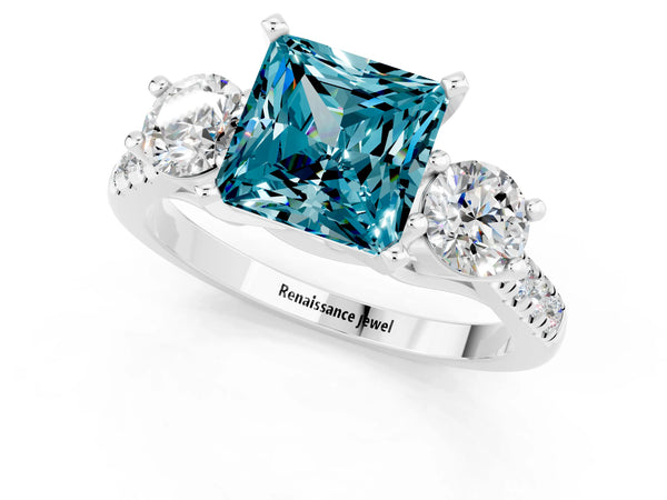 Platinum Three-Stone Princess Cut Blue Topaz Pavé Band with Four-Prong Setting