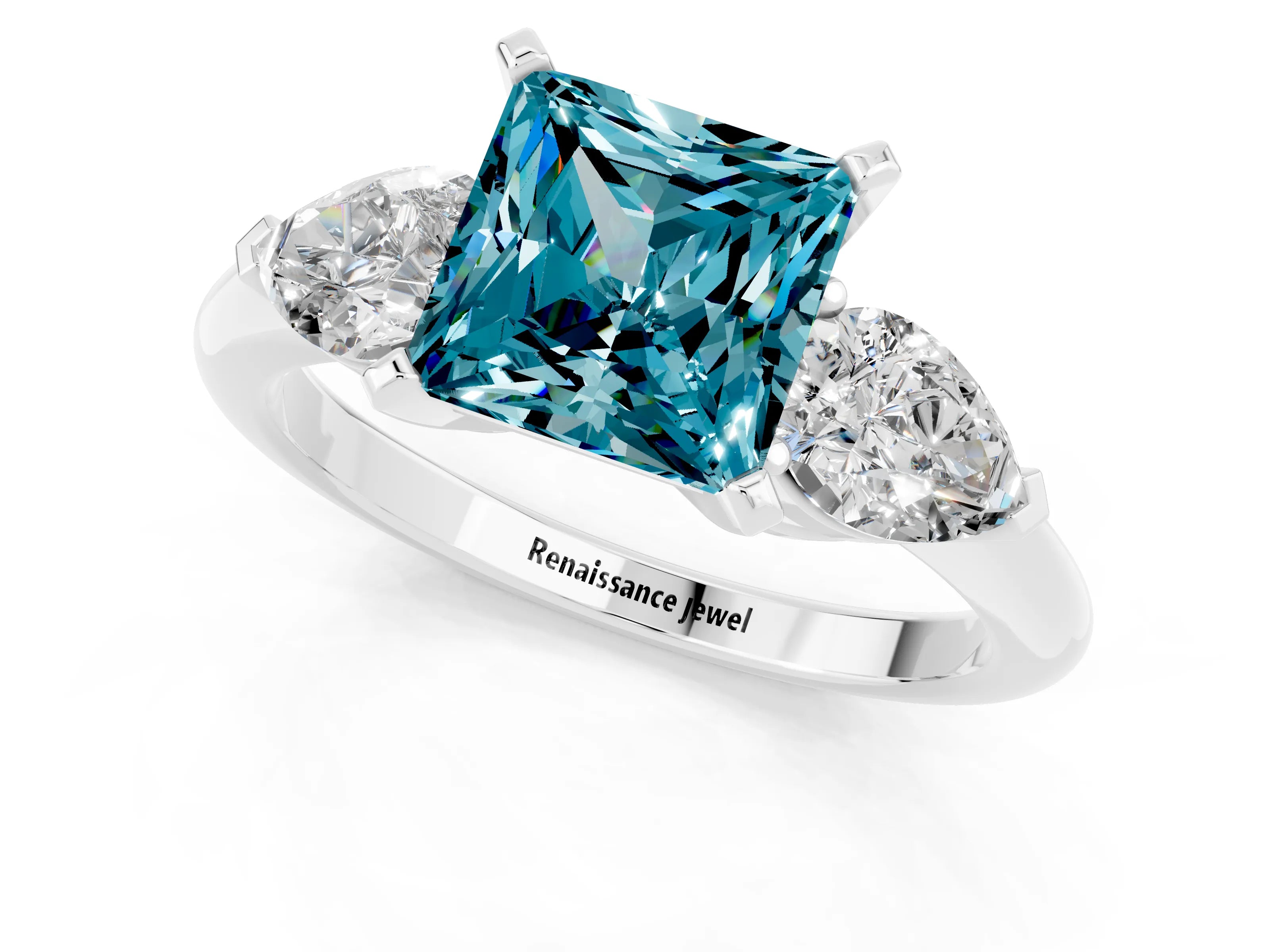 White gold Three-Stone Princess Cut Blue Topaz Ring with Pear Side Stones and Four-Prong Setting_1
