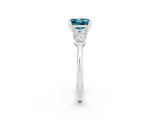 White gold Three-Stone Princess Cut Blue Topaz Ring with Pear Side Stones and Four-Prong Setting_2
