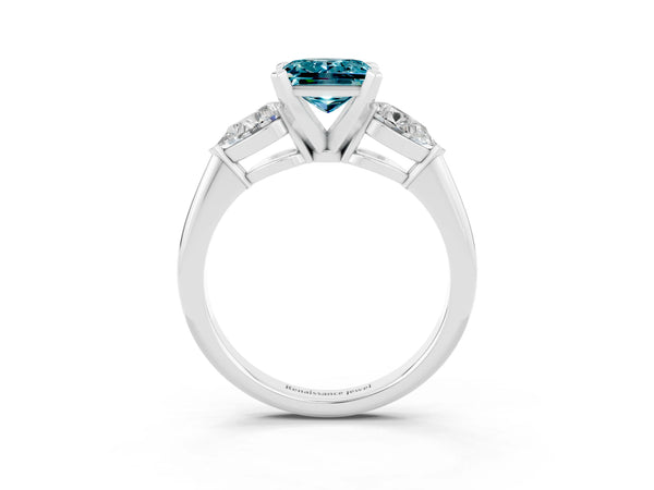 Platinum Three-Stone Princess Cut Blue Topaz Ring with Pear Side Stones and Four-Prong Setting
