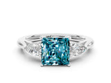 White gold Three-Stone Princess Cut Blue Topaz Ring with Pear  Side Stones in Four-Prong Setting_12