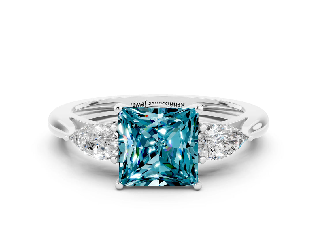 White gold Three-Stone Princess Cut Blue Topaz Ring with Pear  Side Stones in Four-Prong Setting_12