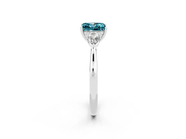 White gold Three-Stone Princess Cut Blue Topaz Ring with Pear  Side Stones in Four-Prong Setting