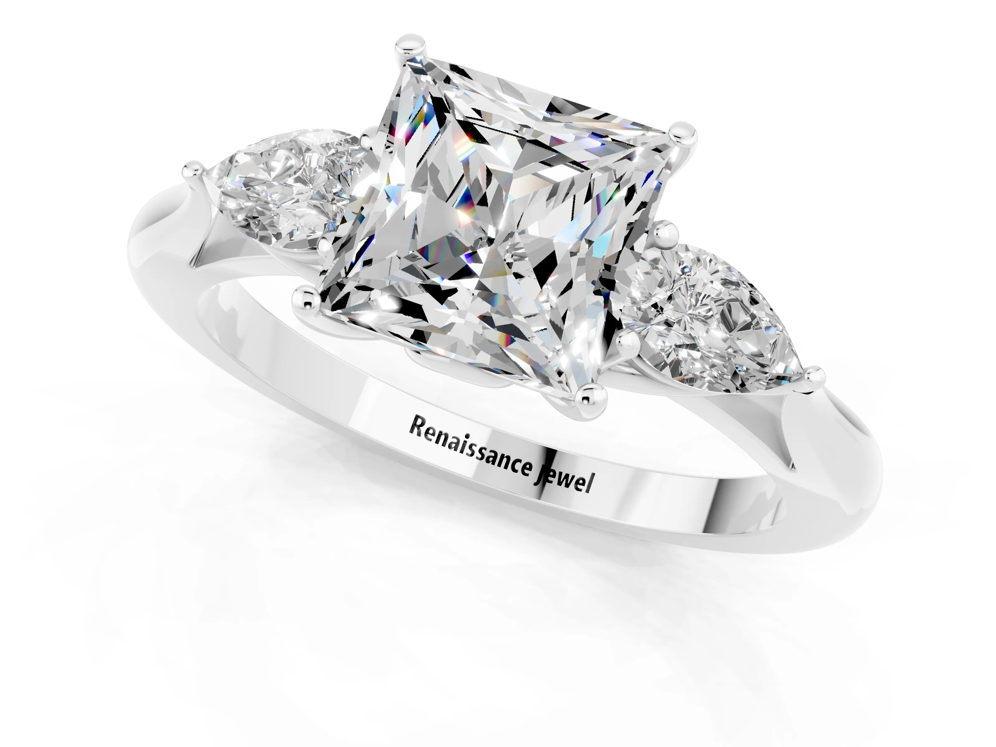 White gold Three-Stone Princess Cut Cut Diamond Ring with Pear Side Stones in Four-Prong Setting_1