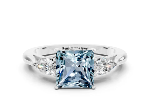White gold Three-Stone Princess Cut Cut Diamond Ring with Pear Side Stones in Four-Prong Setting