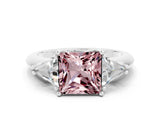 White gold Three-Stone Princess Cut Cut Diamond Ring with Trillion Side Stones and Four-Prong Setting