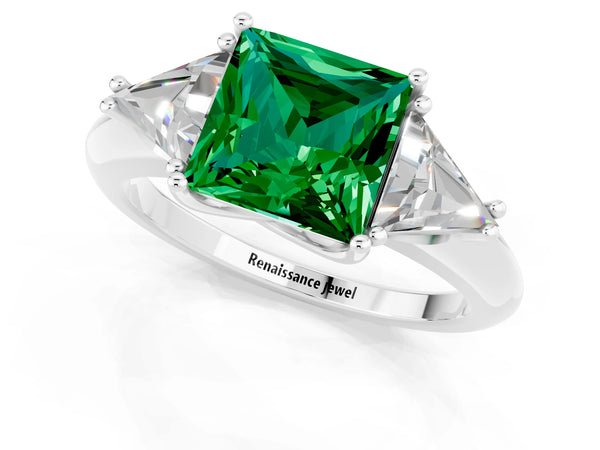 Silver Three-Stone Princess Cut Emerald Engagement Ring with Trillion Side Stones and Prong Setting
