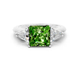 White gold Three-Stone Princess Cut Cut Diamond Ring with Trillion Side Stones and Four-Prong Setting
