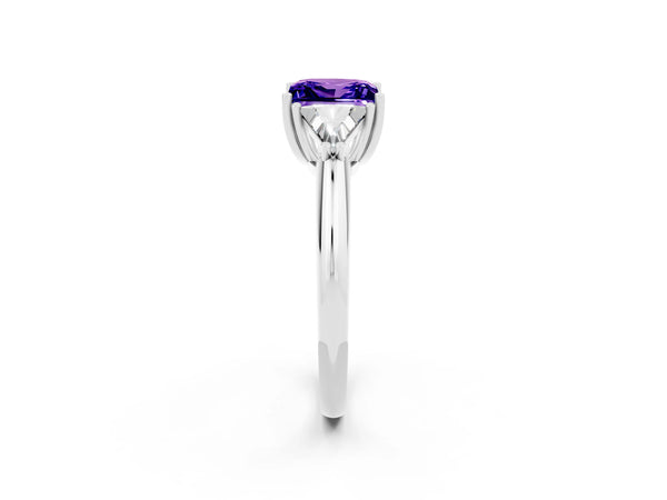 Platinum Three-Stone Princess Cut Tanzanite Engagement Ring with Trillion Side Stones and Prong Setting
