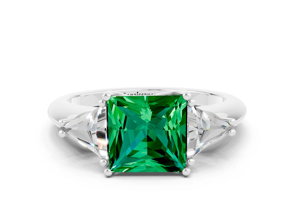Silver Three-Stone Princess Cut Emerald Engagement Ring with Trillion Side Stones and Prong Setting