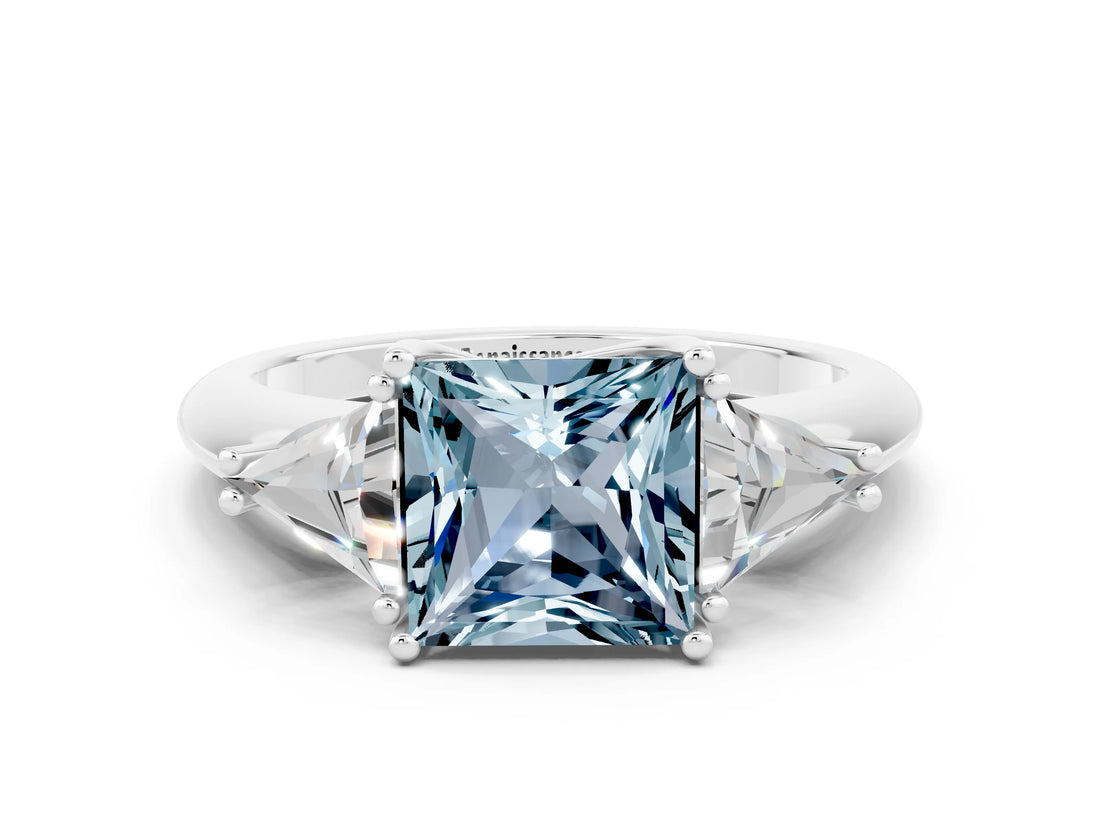 White gold Three-Stone Princess Cut Cut Diamond Ring with Trillion Side Stones and Four-Prong Setting