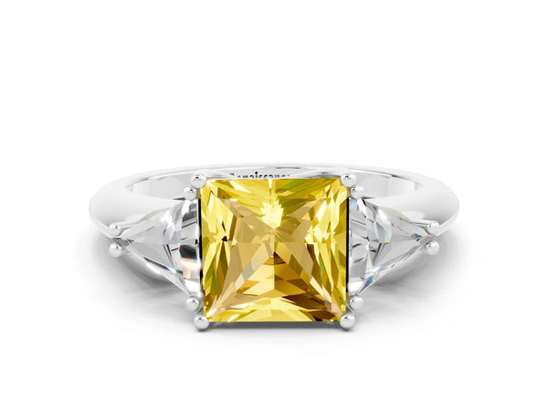 White gold Three-Stone Princess Cut Cut Diamond Ring with Trillion Side Stones and Four-Prong Setting
