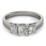 White gold Three-Stone Princess Cut Diamond Engagement Ring with Channel Set Band and Four-Prong Setting 1