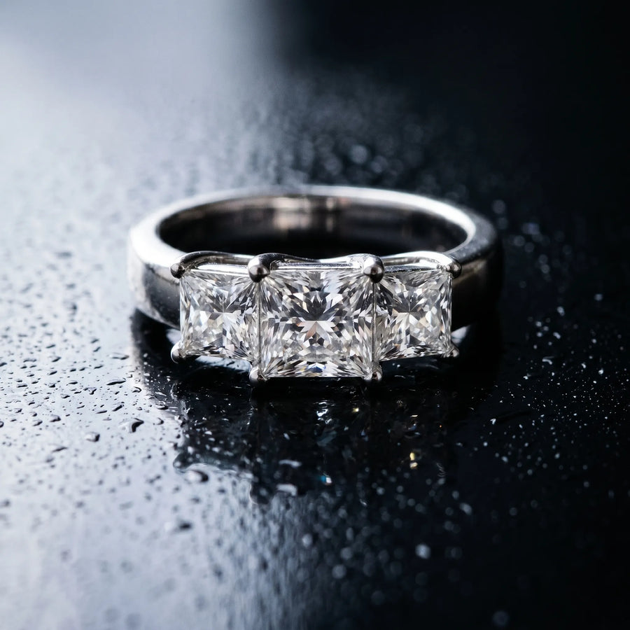 White gold Three-Stone Princess Cut Diamond Ring with Cathedral Band and Four-Prong Setting