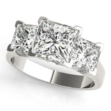 White gold Three-Stone Princess Cut Diamond Ring with Channel Set Band and Four-Prong Setting