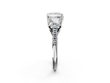 Silver Three-Stone 2.06 Carat E VS1 Princess Diamond Ring with Pavé Band and Prong Setting