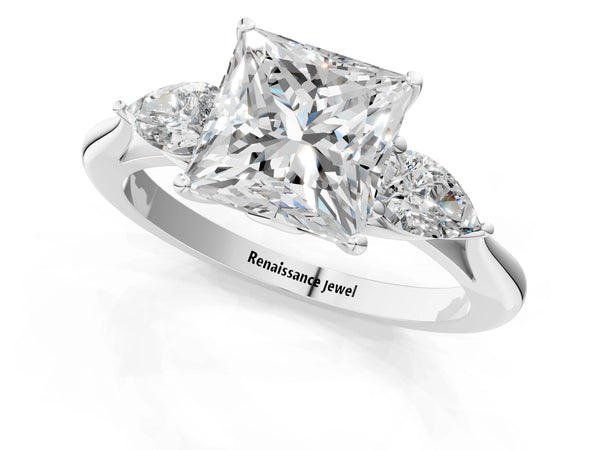 White gold Three-Stone Princess Cut Diamond Ring with Pear  Side Stones in Four-Prong Setting
