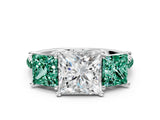 White gold Three-Stone Princess Cut Diamond Ring with Round with Green Sapphire side stone Pavé Band and Prong Setting
