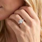 White gold Three-Stone Princess Cut Diamond Ring with Trillion Side Stones and Four-Prong Setting