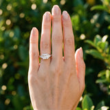 White gold Three-Stone Princess Cut Diamond Ring with Trillion Side Stones on a Split Shank Band_18