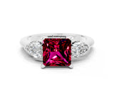 White gold Three-Stone Princess Cut Garnet Ring with Pear Side Stones and Four-Prong Setting