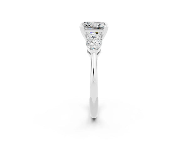 Platinum Three-Stone Princess Cut Moissanite Ring with Pear Side Stones and Four-Prong Setting