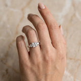 White gold Three-Stone Princess Cut Solitaire Ring with Round Side Stones and Four-Prong Setting_27