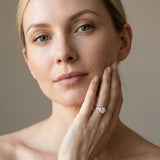 White gold Three-Stone Princess Cut Solitaire Ring with Round Side Stones and Four-Prong Setting_28