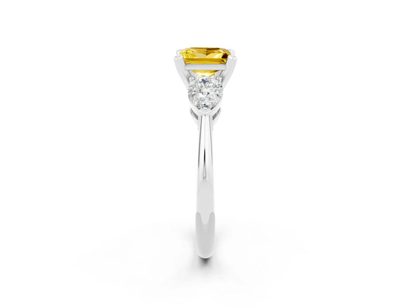 Silver Three-Stone Princess Cut Yellow Sapphire Ring with Pear Side Stones and Four-Prong Setting