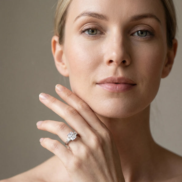 White gold Three-Stone Radiant Cut Diamond Cathedral Engagement Ring with Prong Setting