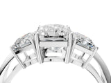 White gold Three-Stone Radiant Cut Diamond Engagement Ring with Prong Setting on a White Gold Band_10
