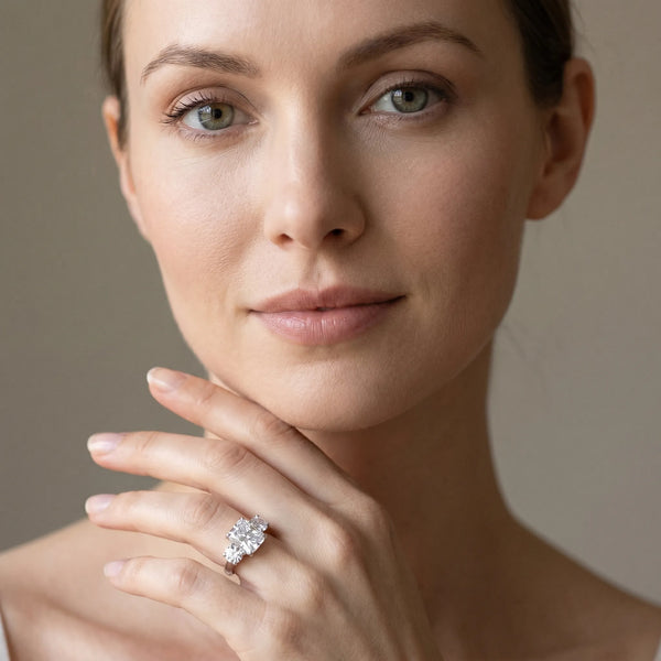 White gold Three-Stone Radiant Cut Diamond Engagement Ring with Prong Setting on a White Gold Band