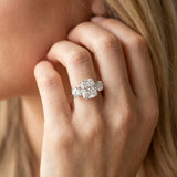 White gold Three-Stone Radiant Cut Diamond Engagement Ring with Prong Setting on a White Gold Band_20