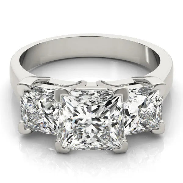 White gold Three-Stone Radiant Cut Diamond Ring with Channel Set Band and Four-Prong Setting
