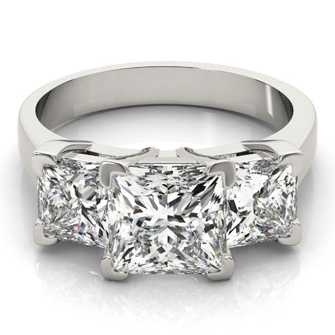White gold Three-Stone Radiant Cut Diamond Ring with Channel Set Band and Four-Prong Setting 2