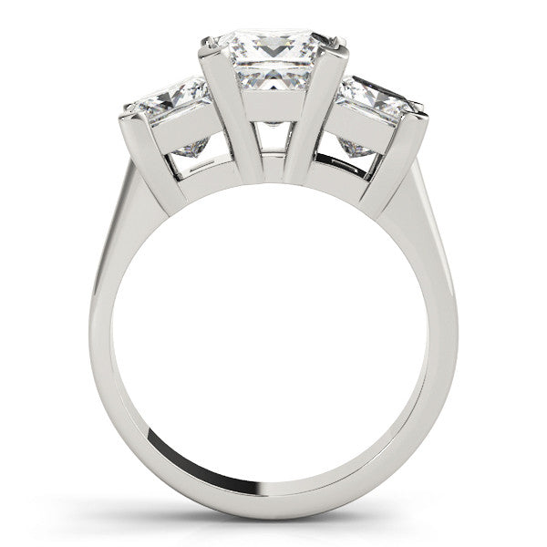 White gold Three-Stone Radiant Cut Diamond Ring with Channel Set Band and Four-Prong Setting