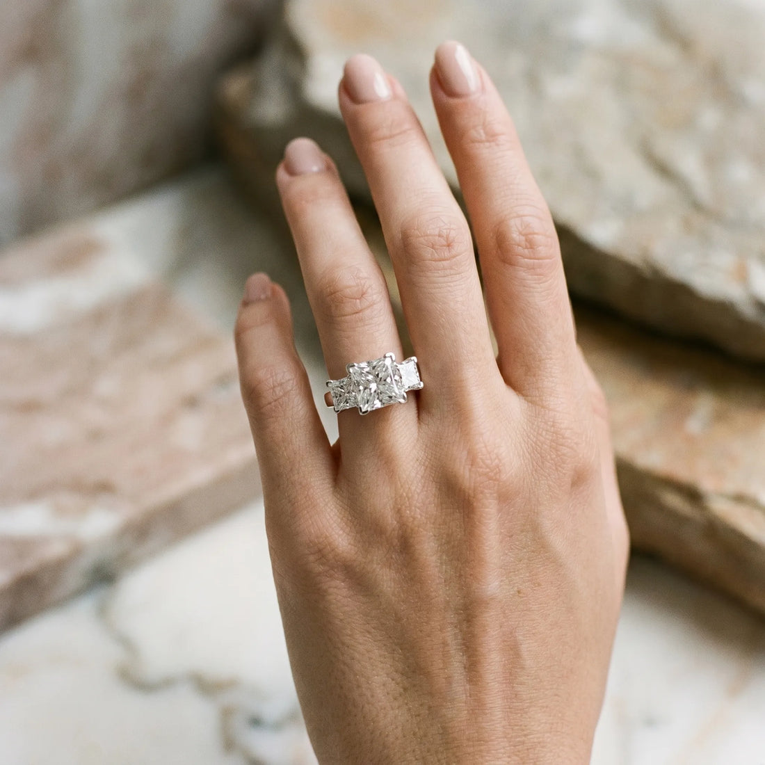 White gold Three-Stone Radiant Cut Diamond Ring with Channel Set Band and Four-Prong Setting_6
