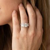 White gold Three-Stone Radiant Cut Diamond Ring with Channel Set Band and Four-Prong Setting_8