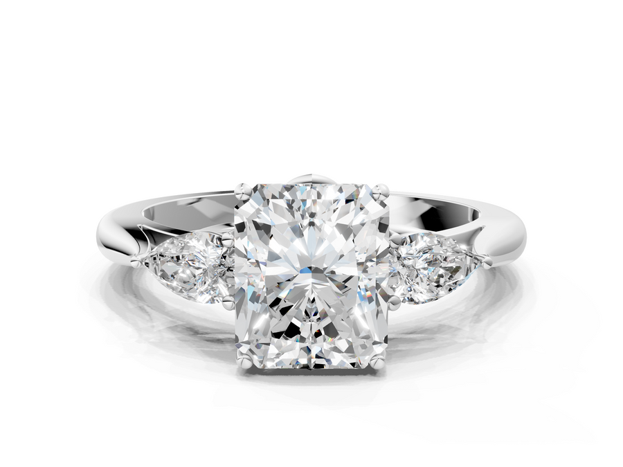 White gold Three-Stone Radiant Cut Diamond Ring with Pear Side Stones in Four-Prong Setting