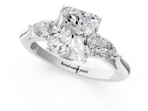 White gold Three-Stone Radiant Cut Diamond Ring with Pear Side Stones in Four-Prong Setting