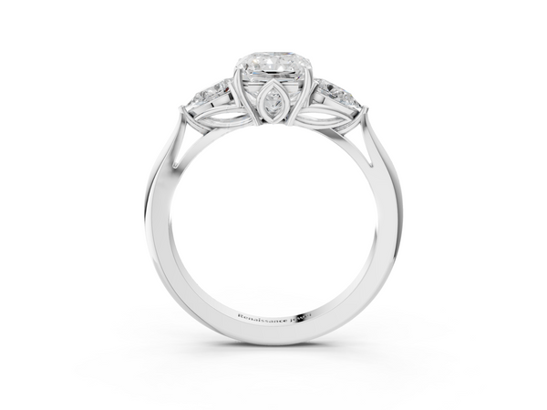 White gold Three-Stone Radiant Cut Diamond Ring with Pear Side Stones in Four-Prong Setting