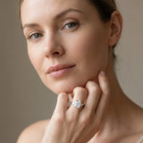 White gold Three-Stone Radiant Cut Diamond Ring with Pear Side Stones in Four-Prong Setting_189